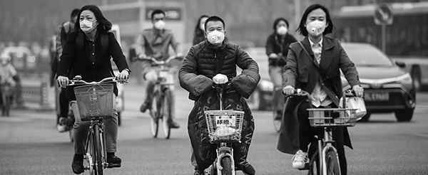 masked cyclists